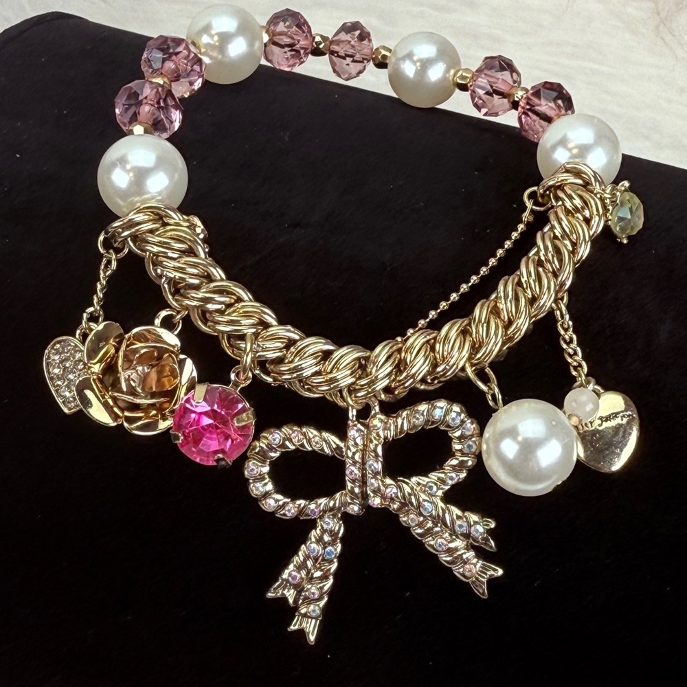 Beautiful, goldtone, multi charm, bling, reflective stretch bracelet